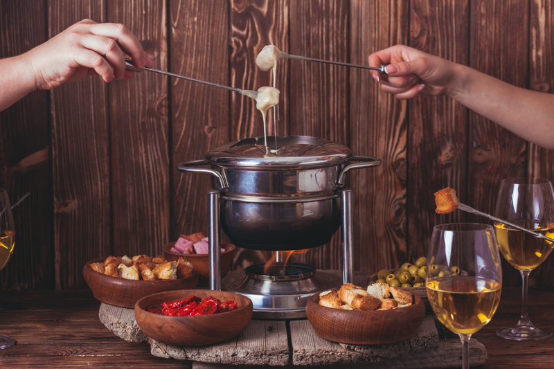 Illustration for article titled Bring back fondue dinner parties, the most maligned of cheese experiences